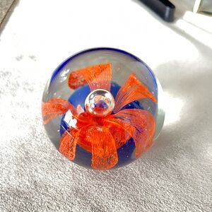 Glass Paperweight with Orange and Blue Design